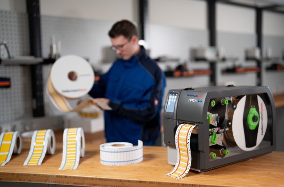 Heat shrink label printer