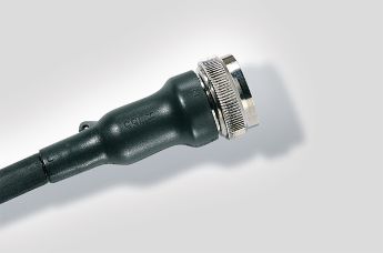 Straight heat shrink boot with rib for connections with circular grooved adapters