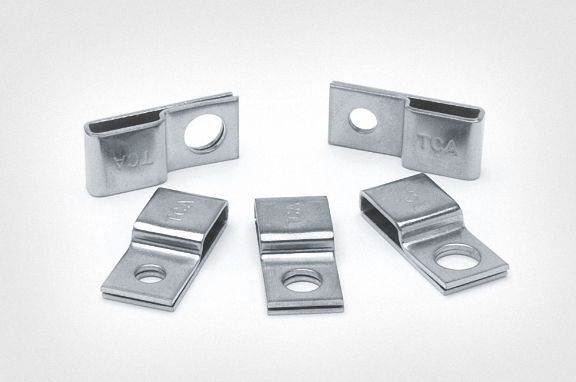 Steel cable clamps for harsh environments