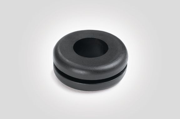 Snap in cable grommet for punched or drilled metal sheets
