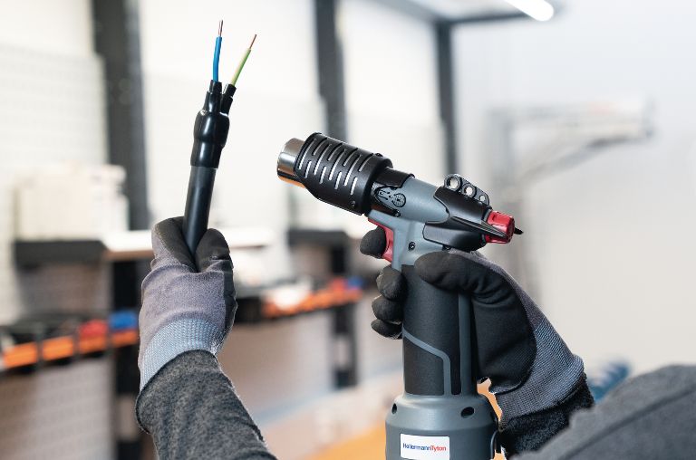 Hot air guns for application of heat shrink tubing