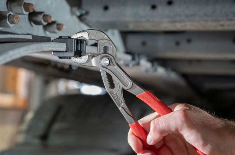 Install edge clip with pliers