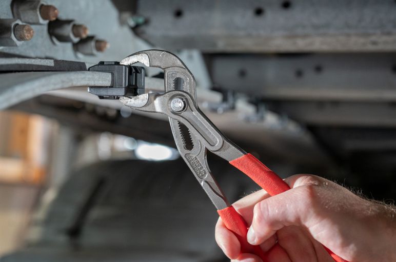 Install edge clip with pliers