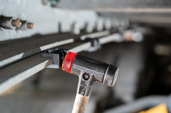 Install edge clip with blow hammer