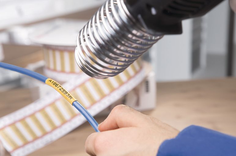 Diesel-resistant heat shrink labels in ladder-style format